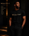 WEALTH=Y Gold Signature Tee - Men's front view with gold logo